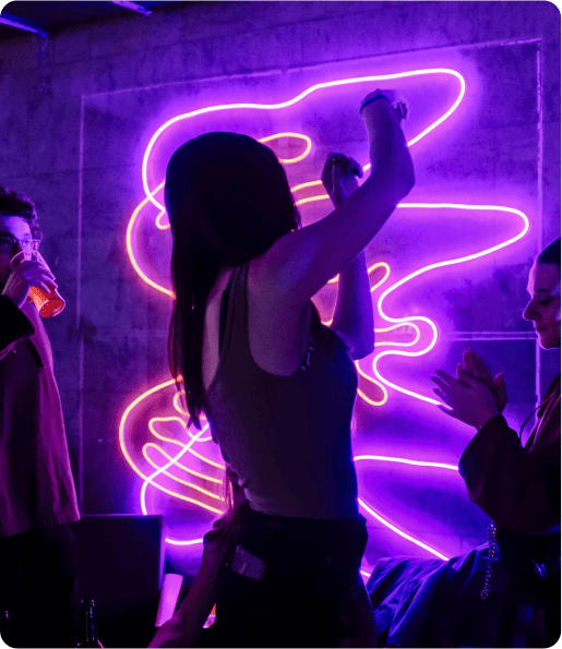 woman partying in neon lights